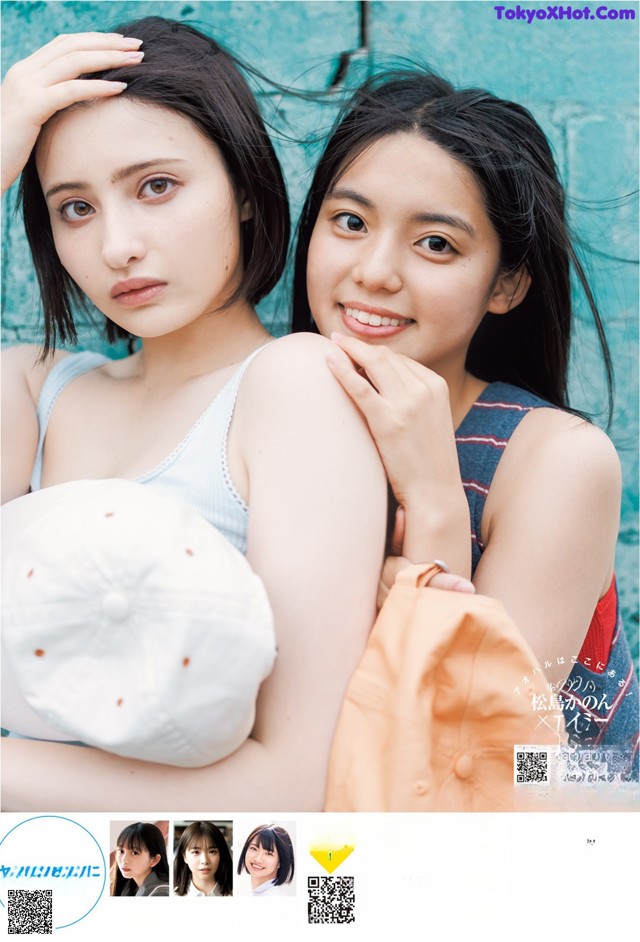 A couple of young women standing next to each other.